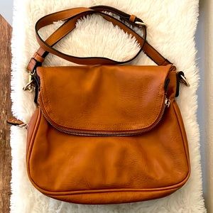 Medium/light brown leather purse. Medium size, gently used.